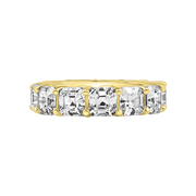 Yellow Gold ring with emerald-cut diamonds