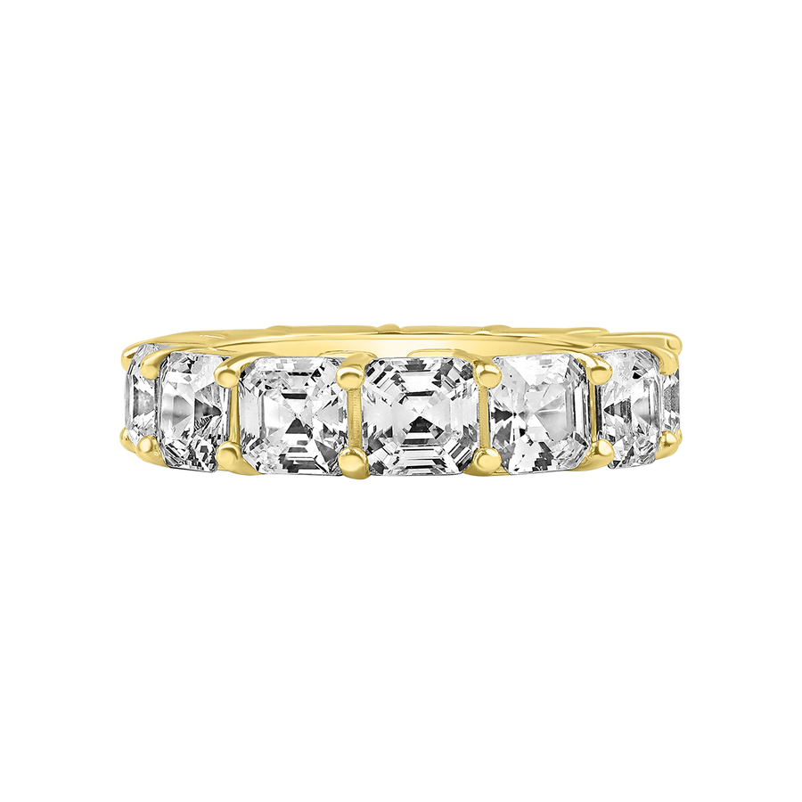 Yellow Gold ring with emerald-cut diamonds